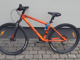 oranžs velosipēds